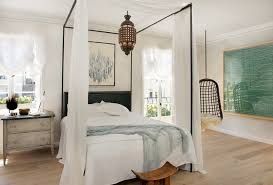 Curtain fitter fitting drapes to four poster bed. 9 Ways To Dress A Four Poster Bed