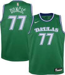 Marked by the neon glow on the letters, numbers and piping, the new mavs city edition jersey reflects the swagger of the big d and the vibrancy of dallas nights. Nike Youth Dallas Mavericks Luka Doncic 77 Green Dri Fit Hardwood Classic Jersey Dick S Sporting Goods