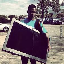 Man walking down the street. I Once Saw A Black Man Walking Down The Street Carrying A Tv And I Thought It Was Mine Then I Got Home And Saw Mine Shining My Shoes 9gag