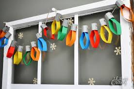 A Cute And Colorful Paper Crafted Christmas Garland We Love The Classic Charm Of Vintage Christm Christmas Lights Garland Christmas Crafts Christmas Decor Diy