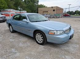 Image result for Light Ice Blue 2009 Town Car