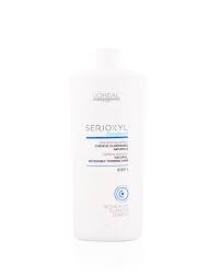 A good clarifying shampoo is one that cleanses your scalp and hair, removes toxins, isn't so abrasive that it causes frizz and tangling, is free of sulfates and parabens, and doesn't strip your hair of its natural oils. L Oreal Professionnel Serioxyl Clarifying Shampoo Natural Hair Step 1 1000 Ml