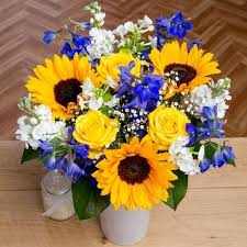 Learn about 62 purple flower types, plus other types of flowers and the meaning of rose colors. Bunches Co Uk Summer Fair Fsufa Bold Yellow Moonwalk Roses Pretty White Stock Bunche White Flower Bouquet Delphinium Flowers Summer Flower Arrangements