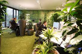 This Office Space Is Designed To Encourage Informal And Accidental Meetings Office Interior Design Green Office Office Space