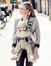Family In The City Mom Carrying Baby In Baby Carrier One In Khaki From Babybjorn