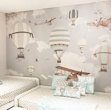 A simple and modern boy's bedroom with colorful wallpaper and a striped rug. Visit The Post For More Oboi Dlya Detskoj Komnaty Nomer Devushki Oformlenie Detskih Komnat