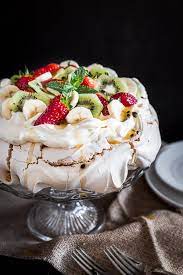 Once the cakes are cool, make the meringue topping. Easy Australian Pavlova Recipe With Topping Ideas Wandercooks