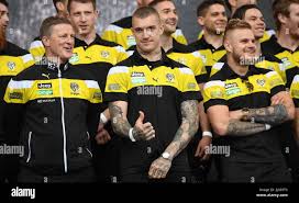 Richmond Tigers coach Damien Hardwick (left), Dustin Martin and Brandon  Ellis (right) are seen at the AFL Grand Final parade in Melbourne, Friday,  September 29, 2017. Richmond play Adelaide in this Saturday's
