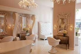 Janelle specializes in unconventional fashion colors and beachy blondes to create the illusion that the sun is always hitting the right spots of the hair. Beverly Hills Salon La Interior Designer Beauty Salon Decor Salon Decor Hair Salon Interior