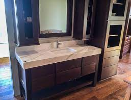 Bathroom basin units add space without cluttering the room. How To Raise Your Countertops K D Countertops