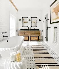 The best tile idea for monochrome bathrooms is to use bright white for walls and statement black tiles for flooring. 20 Modern Farmhouse And Cottage Bathroom Tile Ideas