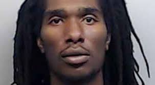 Man arrested for allegedly killing a father in front of...