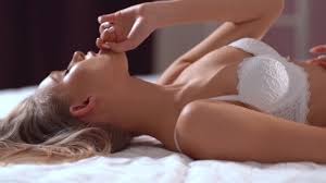 young beautiful sexy girl on bed in lingerie