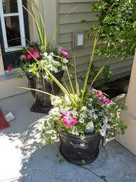 Spring Has Sprung English Garden Themed Flower Pots Flower Pots Outdoor Porch Flowers Front Porch Flower Pots