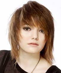 Yes, we know, that long hair needs a lot of attention, but it's a good base for so many hairstyles and haircuts! Medium Straight Light Auburn Brunette Emo Hairstyle With Side Swept Bangs And Light Blonde Highlights