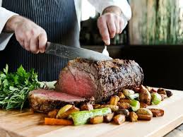 Christmas dinner is a meal traditionally eaten at christmas. Christmas Prime Rib Seattle What S Cookin Christmas Eve Day Event Roundup Seattle Refined Place The Prime Rib Or Boneless Whole Ribeye Roast On Cutting Board That Has Been Covered