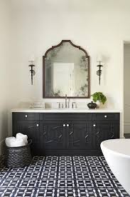 Black And White Moroccan Tiles Black And White Moroccan Mosaic Floor Tiles Lead To A Stunning Black Washstand Complemented Bathroom Design Inspiration White Bathroom Designs Bathroom Design