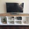 We built a wood plank tv wall as our solution to hiding electronics cords! 3