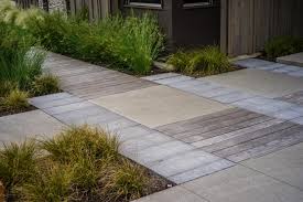Pine wood planks of finger jointed board for wooden furniture designs. Unique Walkway Made Of Concrete And Wooden Planks Hgtv
