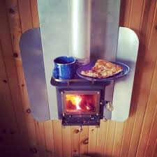 Our 3 flue systems are a popular option for safely venting a cubic mini stove in tiny houses, cabins, vans, rvs, buses, yurts, and all sorts of small spaces. Meanwhile At The Cabin Warming Up Leftover Pizza And Tea On The Cubic Mini Wood Stove Woodstove Cabin Tinyhous Mini Wood Stove Small Wood Stove Wood Stove