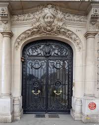 An old iron industrial glass doors. Door Wikipedia