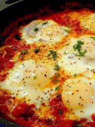 Eggs Poached In Spicy Tomato Sauce Or Shakshouka Shakshuka Cooking Cooking Recipes