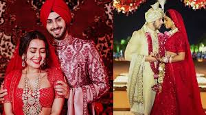 The dress consisted of sheer lace leaves and button detailing down the front, as well as a trendy high neckline and an elaborate 75. Neha Kakkar S Wedding Outfit Looks Heavily Inspired From Priyanka Chopra S D Day Attire See Photos Times Of India
