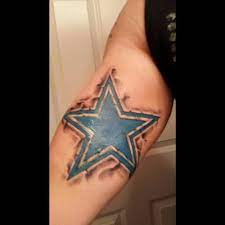 Unlike women, who often make a flaming dallas cowboys star tattoo design on the lower back, the men take advantage of the top, particularly the blade area and the latissimus dorsi. Smoked Dallas Cowboys Star Tattoo On Man Bicep