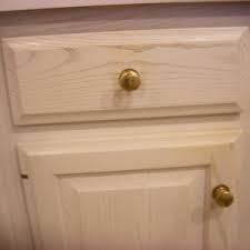 Wipe all the dust particles off, and then sand again with a finer sandpaper, about 220 grit. Cleaning Kitchen Cabinets Thriftyfun