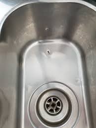 hole in stainless steel sink