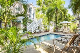 After booking, all of the property's details, including telephone and set amid lush landscaping and featuring a rock waterfall, the pool at havana cabana at key west offers a spacious seating area for sunbathing. Andrews Inn Garden Cottages Tropical Lodgings Key West Fl