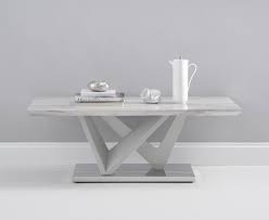 The whole is mounted on a metal chromed base. Reims Marble Effect Carrera Light Grey Coffee Table