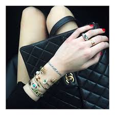 Bow on her neck luce on her side ode alle vita on her elbow foo fighters lyrics on her upper arm triangle on her wrist map on her wrist muse on. Sense Of Style On Instagram We Re Obessing Over Chiara Ferragni S Diamond Evil Eye Bracalets By Netali Nissim A Chiara Ferragni Gioielli Tatuaggi
