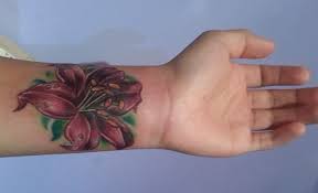 Top 25 Interesting Lily Tattoos Designs And Their Meanings Styles At Life Flower Cover Up Tattoos Cover Up Tattoos Lily Tattoo