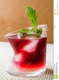 The presentation of your classic malibu sunset cocktail recipe is all important! Malibu Sunset Cocktail With Mint Leaves Stock Photo 97225609 Megapixl