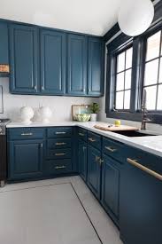 Purchase an unpainted kitchen island and stain or paint it to unify the overall look of your kitchen. The Tile Shop San Dona Marble Floors With Black Pinstripe And Parma Grey Walls For Kitchen Updates Contemporary Kitchen Living Room Kitchen Grey Walls