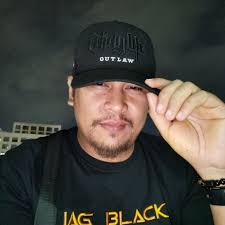 The St. La Salle Hall is illuminated in green and maroon to highlight the  partnership of De La Salle University and University of the Philippines for  social entrepreneurship and service learning. DLSU