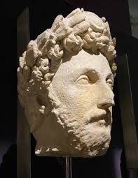 A colossal statue of Emperor Augustus seated and wearing a laurel wreath  from the Augusteum of Herculaneum. White marble, 1st Century AD. The  National Archaeological Museum of Naples. #EmperorAugustus #RomanEmpire  #AncientRome #Archaeology #
