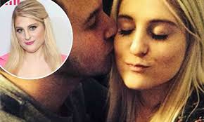 Meghan Trainor receives kiss from Nick Jonas' manager Cory Andersen