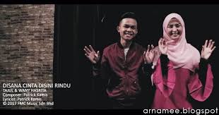 He is famous for being a world music singer. Lirik Di Sana Cinta Di Sini Rindu Tajul Ft Wany Hasrita Arnamee Blogspot