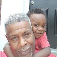 Sugar" Ray Robinson signs autographs alongside his entourage in Paris, 1950.