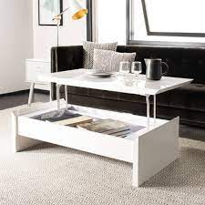 This coffee table with lift top also features open shelves for additional storage and display. Coffee Table White Safavieh Extendable Coffee Table Coffee Table Lift Top Coffee Table