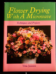 Pressing flowers between boards or sheets of cardboard takes weeks. Flower Drying With A Microwave