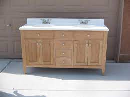 If you plan to use the same hinges, you can remove the door and leave the hinge attached to the vanity cabinet, unless you plan to paint your furniture. Shaker Style Cherry Tall Bath Vanity With A 2 Sink Top The Cabinet Has 4 Centrally Locate Diy Bathroom Vanity Diy Bathroom Vanity Plans Unique Bathroom Vanity