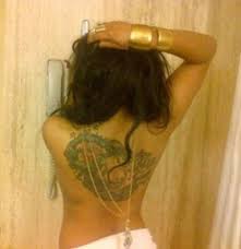 She captioned it how i sleep knowing that i ain't gat no chills!! Tonto Dikeh Shows Off Back Tattoo