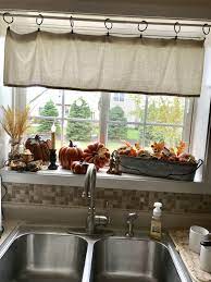 Universal short curtains that do not cover the window sill will help complete the kitchen space. Kitchen Window Sill With A Touch Of Fall Decor Kitchen Window Decor Window Sill Decor Window Ledge Decor