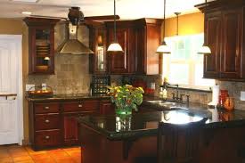 There's something about dark stained wood that absolutely screams luxury. Kitchen Backsplash Ideas For Dark Cabinets Novocom Top