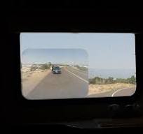 Rear window Fresnel lenses for full view behind