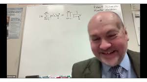 q-Factorization of power series