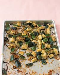 Toss zucchini in oil making sure to coat all sides and lay slices flat onto a sided cookie sheet. Roasted Zucchini With Thyme Recipe Martha Stewart